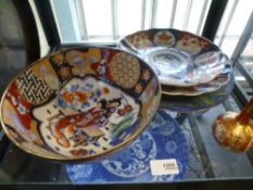 A selection of oriental decorative plates, most of Chinese origin, and an ornate bowl depicting