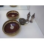 A silver lot comprising of salt and pepper shaker, two coasters and a cruet, Sheffield and