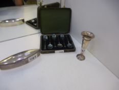 A silver lot comprising of a cased set of spoons, a small vase and an oval trinket box. Spoons