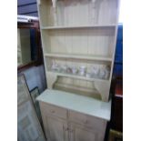 A painted pine dresser and rackback