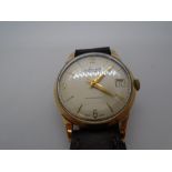 Vintage gent's Accurist 21 jewell automatic wristwatch, possibly 9ct on brown leather strap, surface