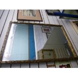 A gilt oblong wall mirror, 65 x 95 cms