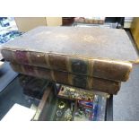 The family Bible circa 1800 in two volumes, brown full leather bindings,