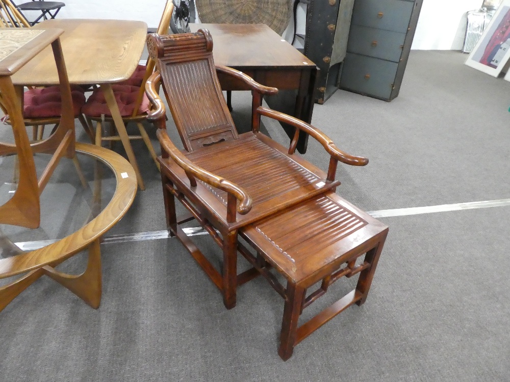 A Chinese hard wood plantation chair with pull out foot rest