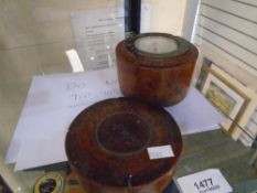 An oriental compass, probably Chinese in wooden circular case with inscribed lid