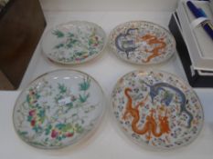 A pair of Chinese dishes decorated flowers, and another pair decorated dragons