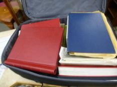 A suitcase of stamps, mainly GB, Victorian and later, in albums and loose