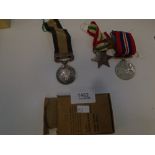 A ladies General Service medal with Northwest Frontier bar, 1936 - 1937, and three other medals from
