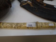 An oriental carved bone dagger