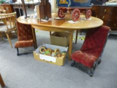 A pair of Victorian ebonised child's chairs, having buttoned upholstery