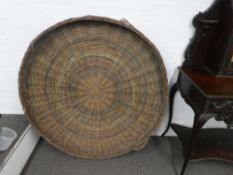 An Eastern European circular fruit drying basket, diameter 123 cms