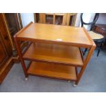 A vintage teak three tier tea trolley, probably 1970's, 68cms