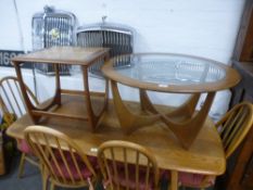 A G-Plan circular coffee table with glass top and a teak table with tiled top