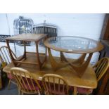 A G-Plan circular coffee table with glass top and a teak table with tiled top