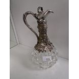 A Victorian silver Claret jug, with decorative and ornate vine and grape decoration and cross cut