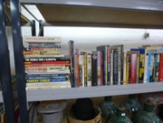 A shelf of Military books and similar