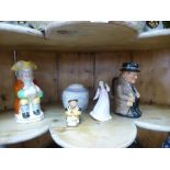 A Wiston Churchill Doulton toby jug, a pair of Staffordshire spaniels and sundry