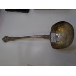 A large heavy silver ladle, stamped London 1872 Charmer and Co, weight approx 9.6 ozt. Decorative