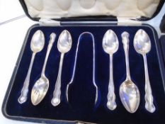 A set of 6 silver hallmarked tea spoons and sugar tongs and a further set of 12 silver hallmarked
