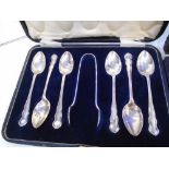 A set of 6 silver hallmarked tea spoons and sugar tongs and a further set of 12 silver hallmarked