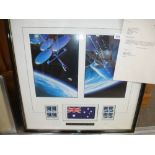 A stamp Art framed display for the Space Shuttle Discovery which carried the official Aussat flag,