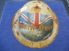 WW2 Desert Rat Memorial Helmet. A genuine WW2 British Brodie Helmet with a post war memorial
