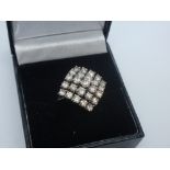 18ct two tone square cluster ring, size O, marked 750, total weight approx 5g