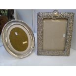 A Victorian silver easel photo frame with pierced decoration of flowers and scrolls of good