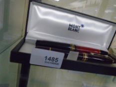 MONTBLANC; a Hemmingway ball point and a maroon fountain pen