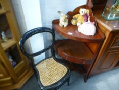 An antique mahogany corner washstand, having central drawer and a Victorian cane seated chair