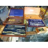 An early 20th century drawing set by Stanley, in mahogany case and a quantity of similar items