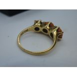 14K yellow gold dress ring set with three coral stones, size O, total weight approx 4g