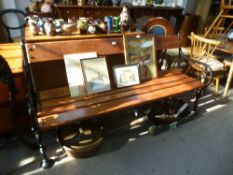 A Victorian style urn and wooden slatted bench having black painted ends, 167cms