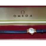 Vintage ladies Omega wristwatch with black leather strap in an Omega presentation box, very light