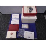 An Omega Seamaster 2002 wristwatch complet with original box, warranty card, booklets,