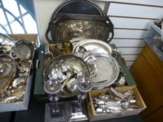 A pair of silver plated candlesticks, cutlery and sundry plated items