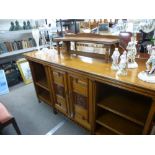 Doveston, Bird and Hull; an Aesthetic movement walnut sideboard with mirrored superstructure,