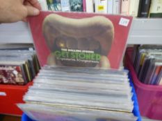 A blue crate of Rock and Pop LPs