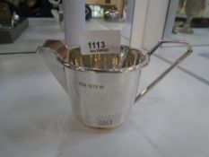 A silver high quality jug stamped Birmingham 1931, maker's mark A L Davenport Ltd., along with a