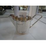 A silver high quality jug stamped Birmingham 1931, maker's mark A L Davenport Ltd., along with a