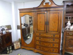 A good quality Edwardian inlaid satinwood wardrobe having single mirror door bedside four drawers