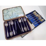 A set of Victorian decorative cased silver teaspoons with sugar tongs included, stamped Sheffield