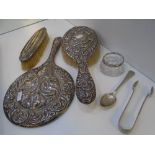 A Silver very decorative hand mirror stamped Birmingham 1911, maker's mark unknown, dressing table