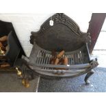 An old cast iron fire basket with brass decoration and one other