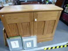 An old pine two door cupboard with internal drawers, on plinth base, 118cms