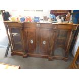 A Victorian burr walnut Credenza, having pair of central cupboard doors with four turned pillars,
