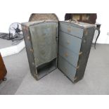 An early 20th century wardrobe travelling trunk by the Osh Kosh Trunk Company