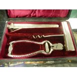 A vintage cigar companion set in its original case