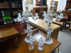 Triebner, Ens and Eckert; a pair of late 19th century figural candelabra, some restoration, and a