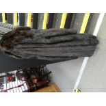 A ladies brown fur coat